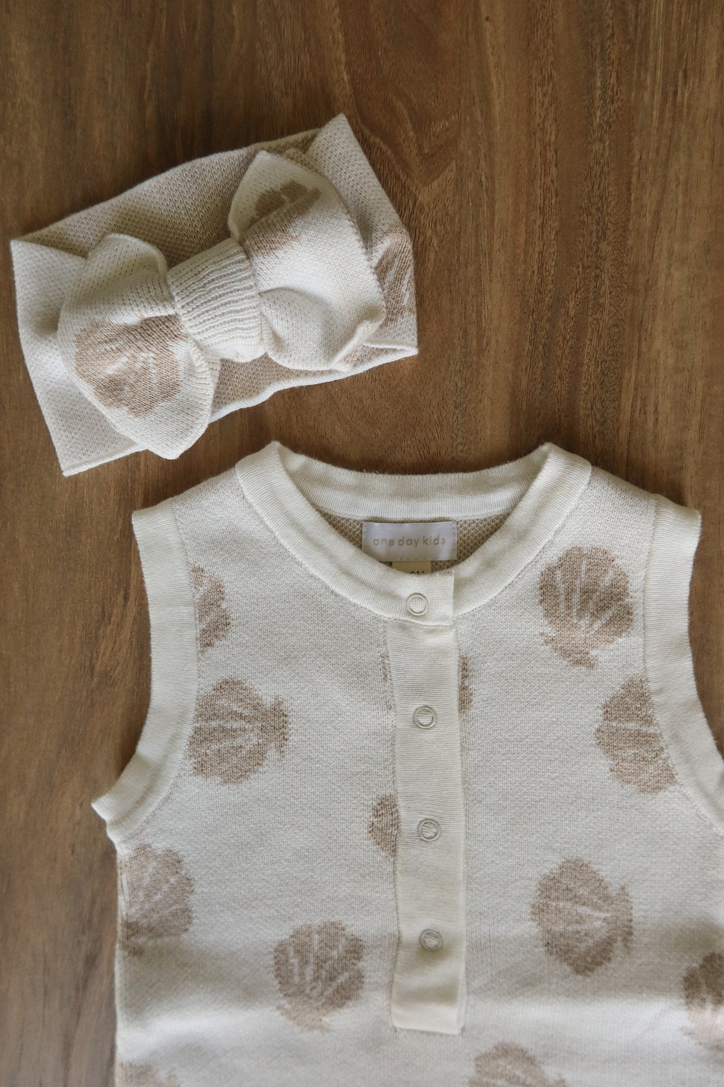 short sleeved shell knit romper