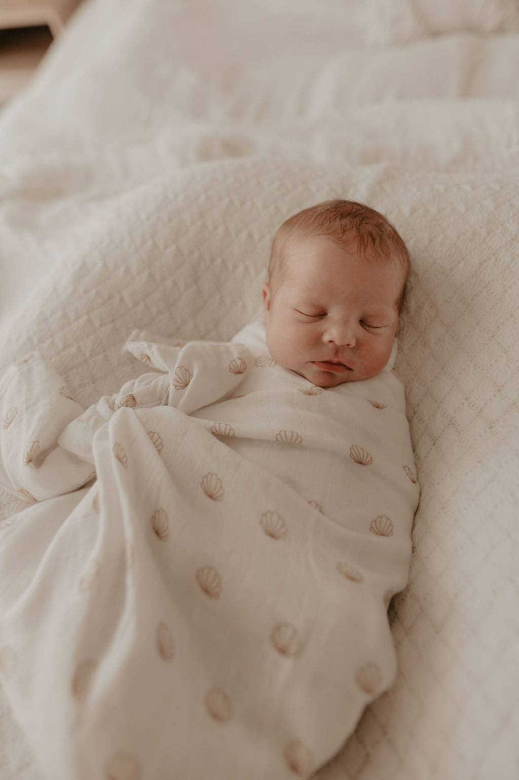 nude shell cotton & bamboo swaddle