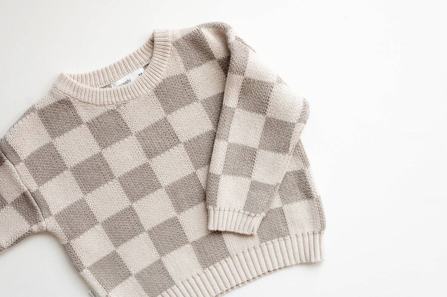 checkered knit sweater