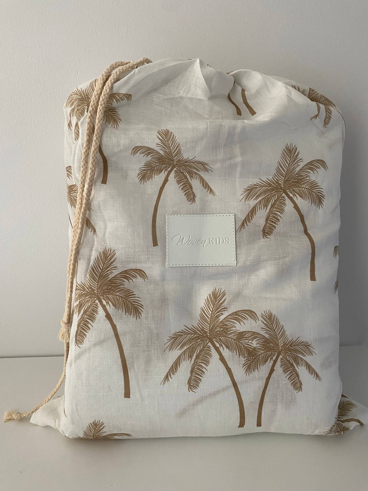 palm tree quilted linen play mat