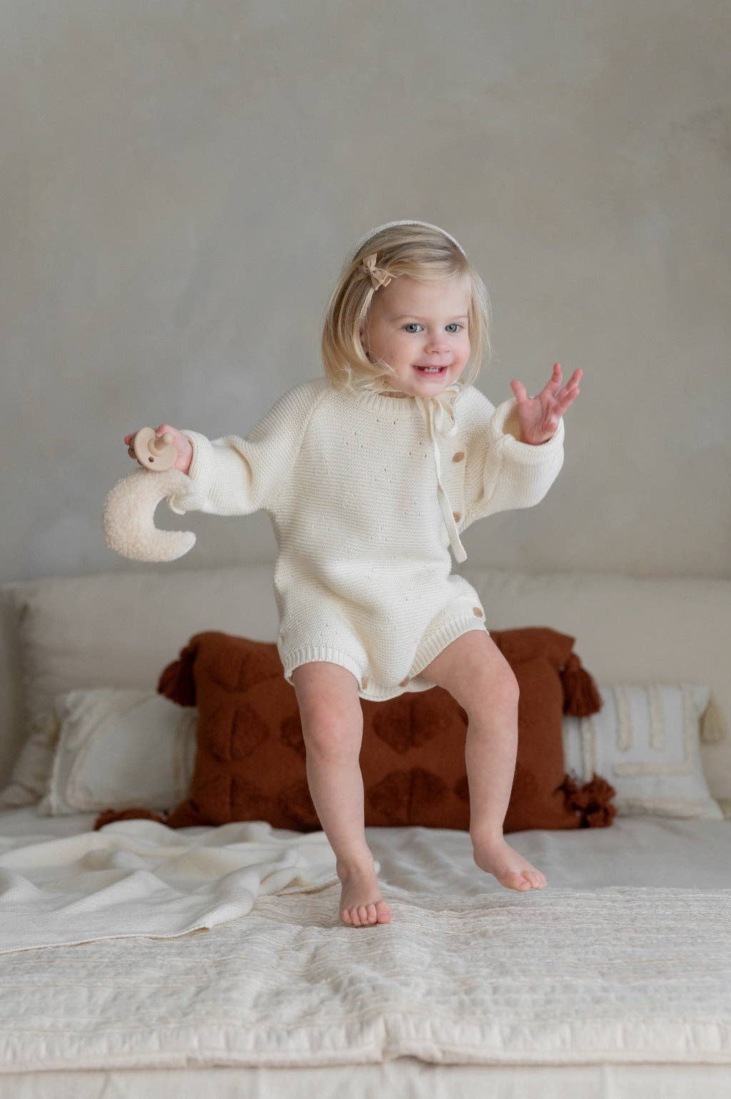 creme romper with matching bonnet