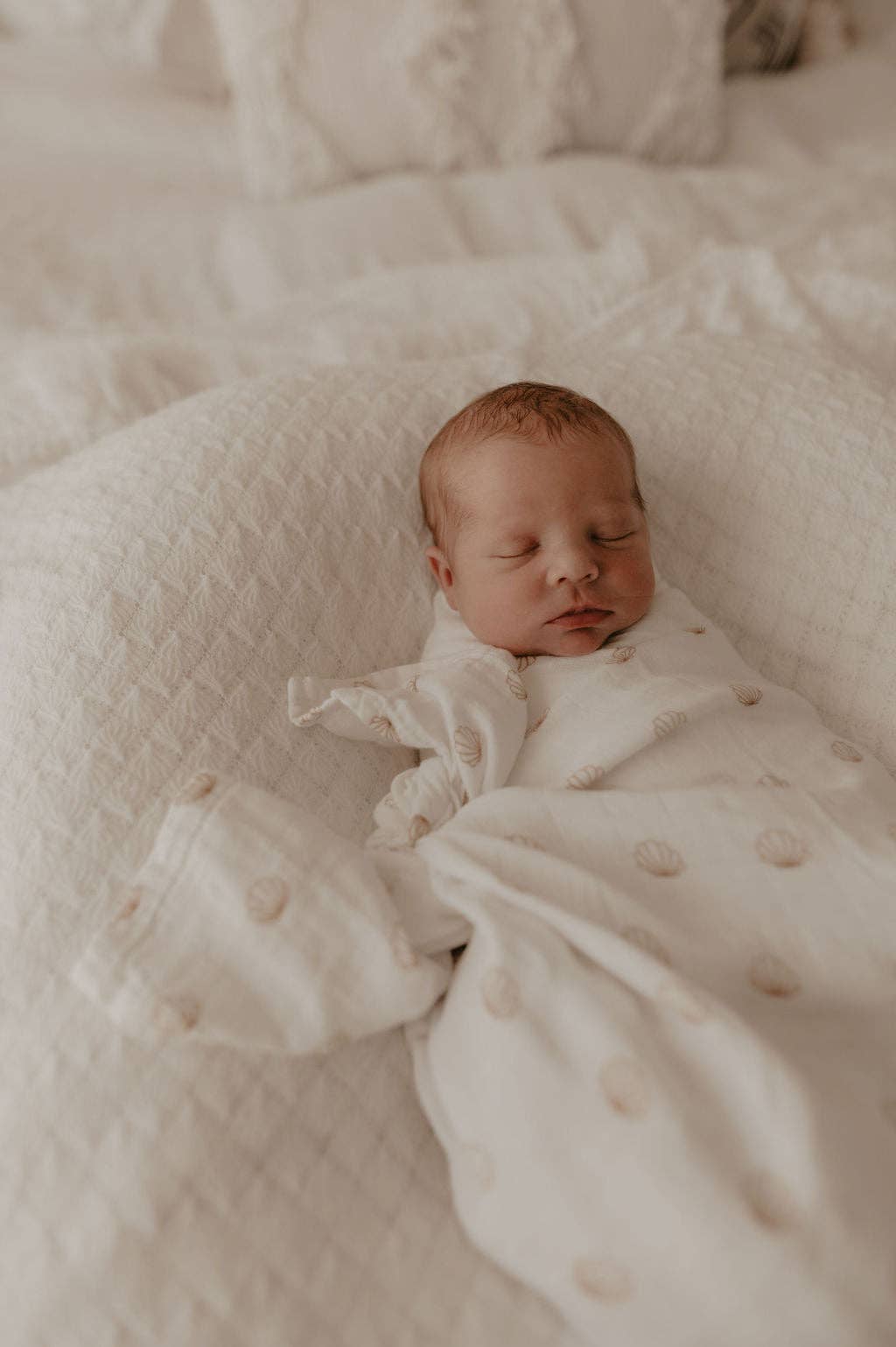 nude shell cotton & bamboo swaddle