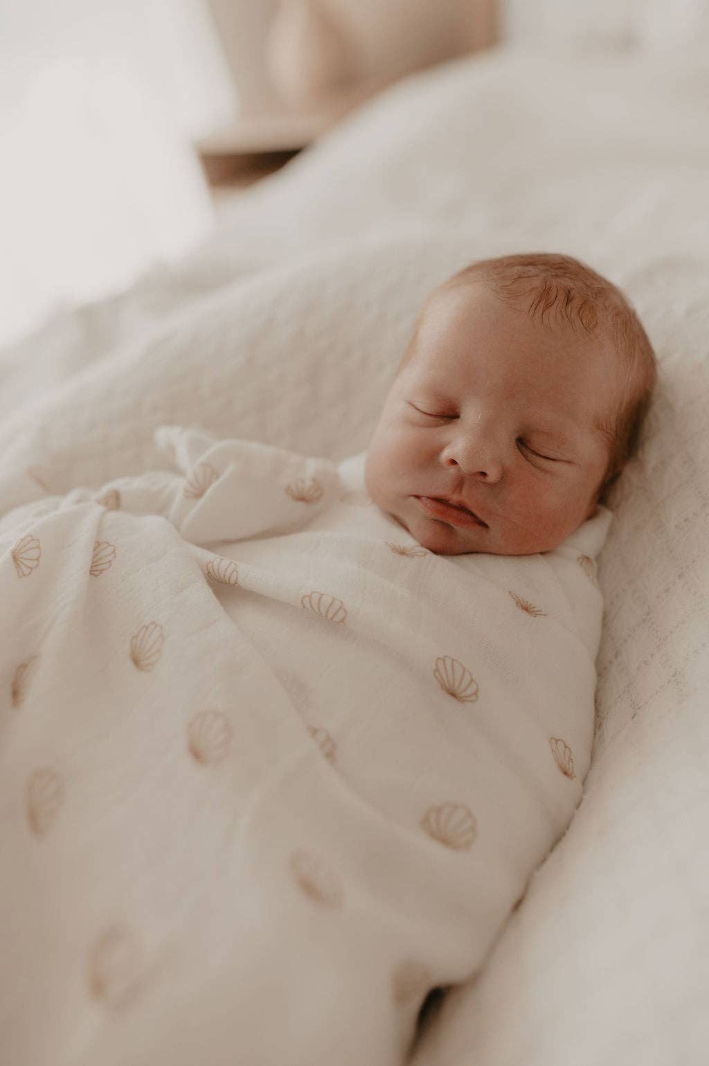 nude shell cotton & bamboo swaddle